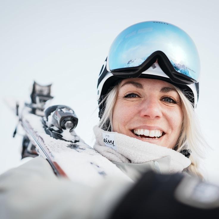 Kaveri Mehta, Lead Design Curator at Copper Meadow Lane, reviewing corporate floral arrangements